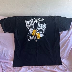 Good condition I never put it in dryer, heavyweight ribbed Coker tshirt